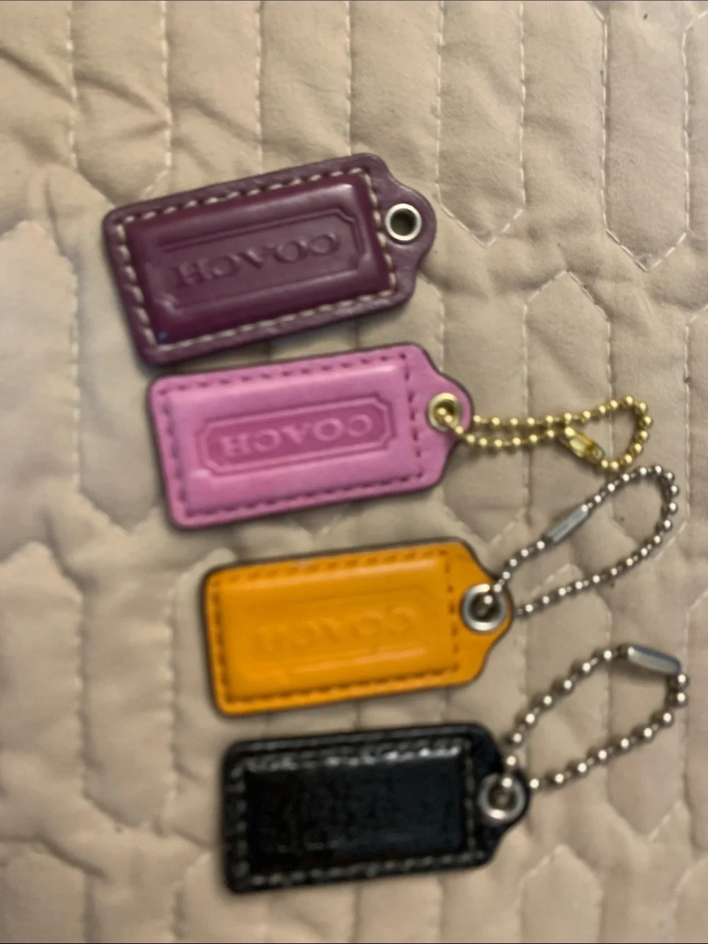 Bundle 4 Coach Leather Mini Tag Keychain Set — Plum, Pink, Mustard, Black